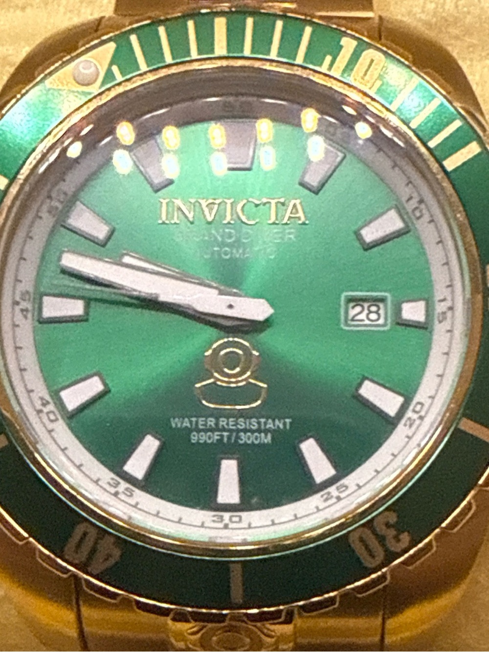 Invicta Pro Diver model 19869 Green Dial Gold Band